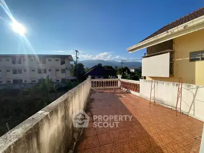 Spacious balcony with scenic mountain views and sunny exposure.