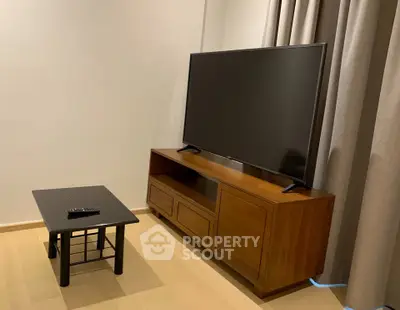 Modern living room with sleek TV stand and minimalist decor