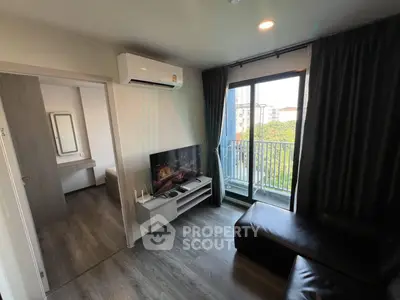 Modern living room with balcony view in stylish apartment