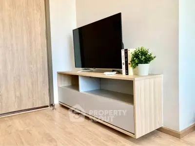 Modern living room with sleek TV stand and minimalist decor