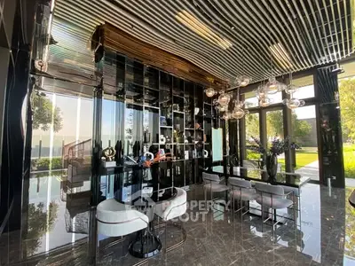 Luxurious modern living room with sleek design and floor-to-ceiling windows