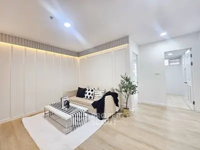 Modern living room with stylish decor and cozy seating area