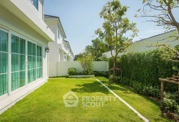 Spacious green garden with lush landscaping in modern residential property