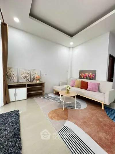 Modern living room with stylish decor and cozy seating area