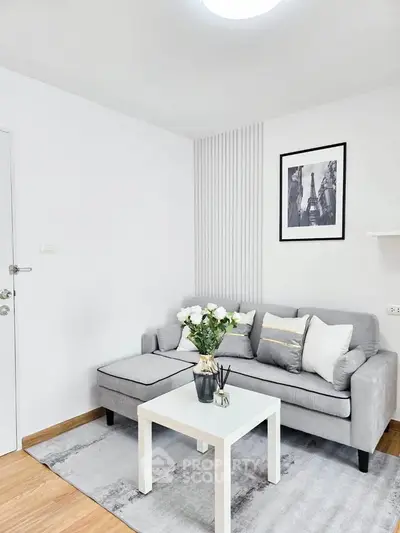 Chic modern living room with stylish gray sofa and elegant decor