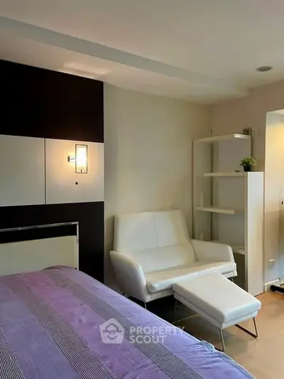 Modern bedroom with stylish furniture and cozy ambiance