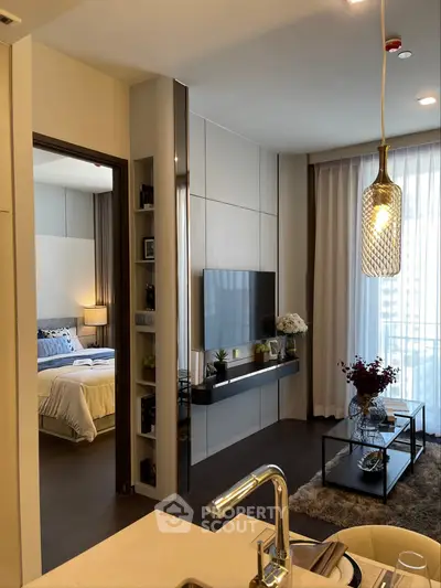 Modern apartment interior with stylish living room and cozy bedroom view