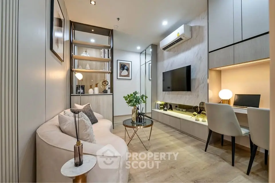 Modern living room with elegant decor, cozy seating, and integrated workspace, perfect for urban living.