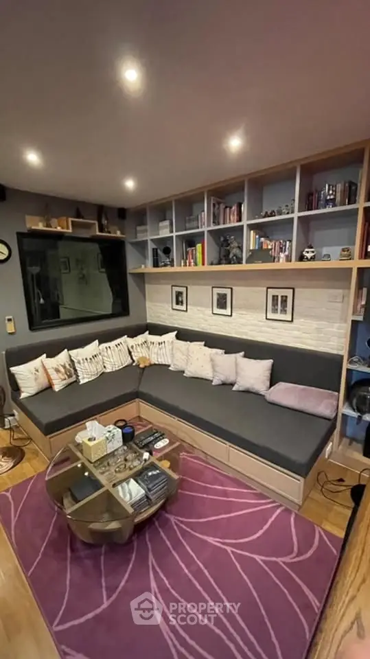 Cozy living room with built-in shelves and modern decor