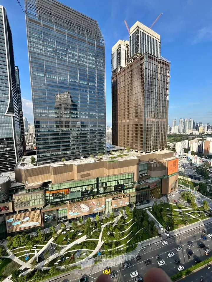 Stunning cityscape view of modern skyscrapers with lush green rooftop gardens.