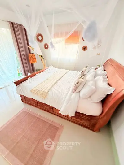 Charming bedroom with elegant wooden bed and soft lighting, perfect for relaxation and comfort.