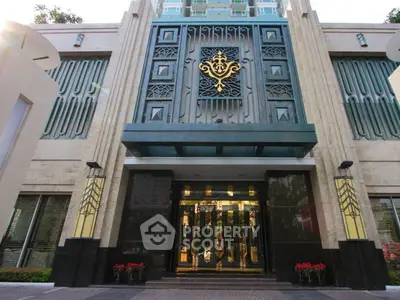 Luxurious building entrance with ornate design and modern architecture