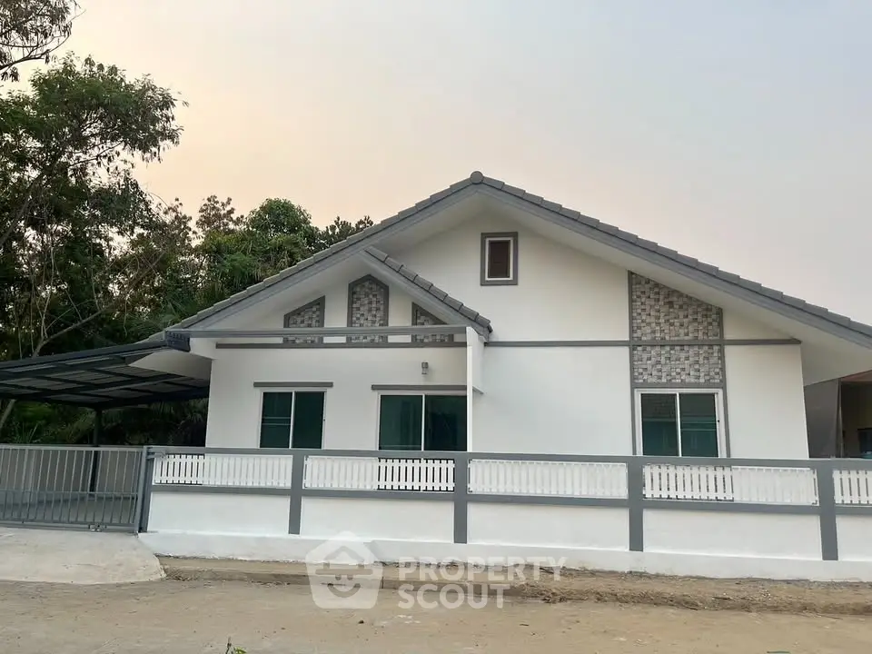 Charming single-story home with modern design and spacious yard in serene neighborhood.