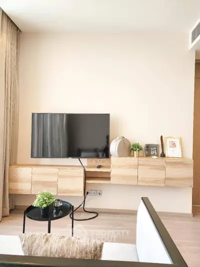 Modern living room with sleek TV setup and stylish decor