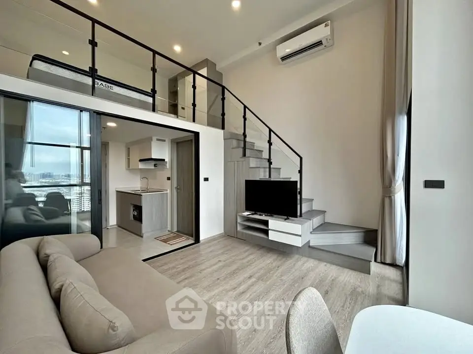 Modern loft apartment with mezzanine, stylish living area, and large windows offering city views.