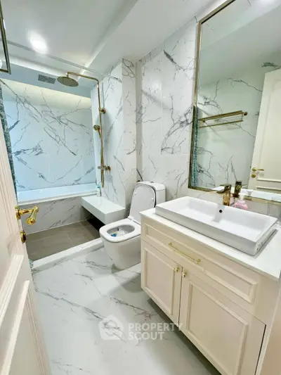 Luxurious marble bathroom with modern fixtures and elegant design