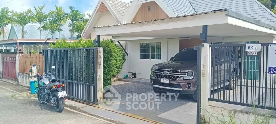 Charming suburban home with carport and lush greenery, perfect for modern family living.