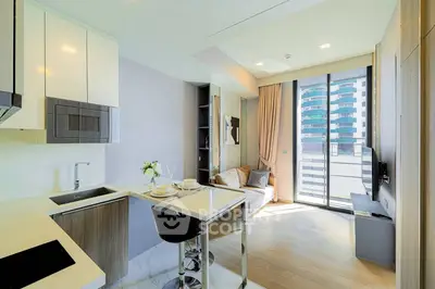 Modern open-layout kitchen and living room with sleek design and large windows in a high-rise apartment.