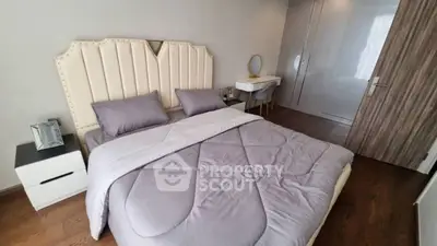 Modern bedroom with stylish bed and elegant decor