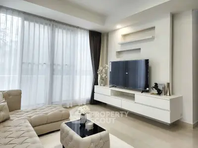 Luxurious modern living room with elegant decor and natural light