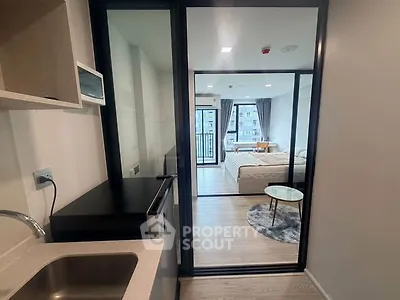 Modern studio apartment with open layout and stylish furnishings