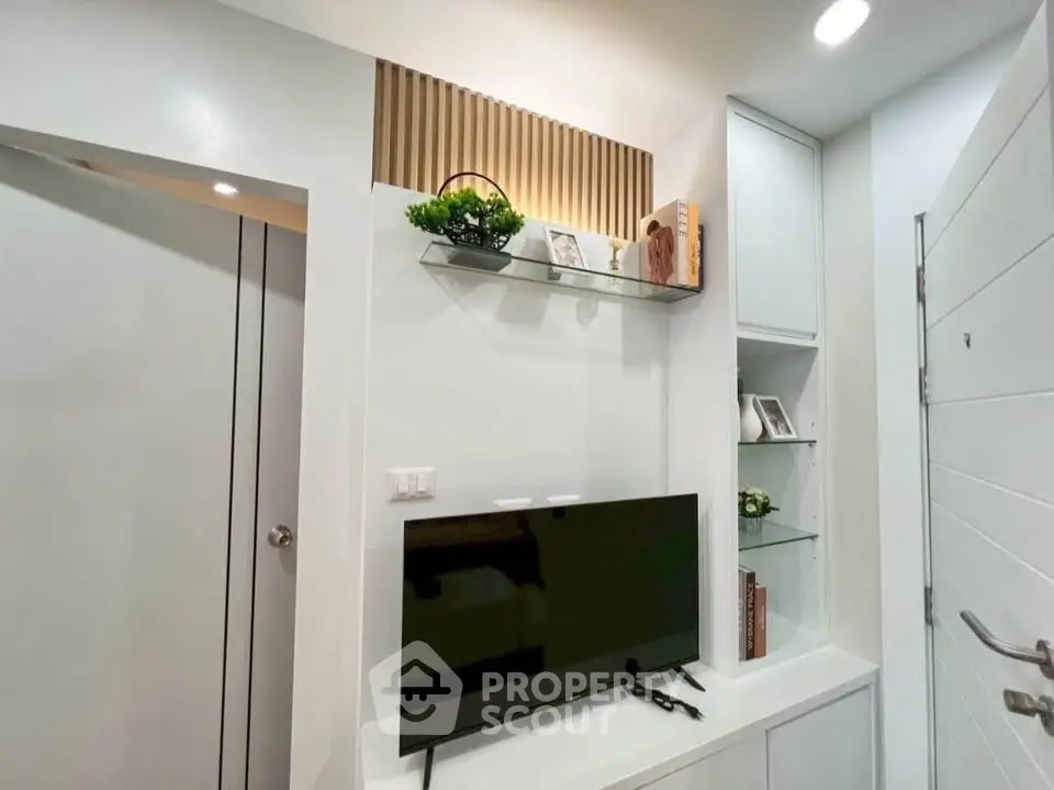 Modern living room with sleek TV setup and stylish decor