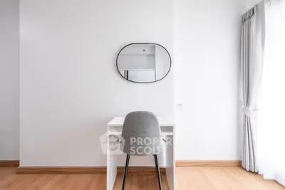 Minimalist study area with sleek desk and modern chair in bright room