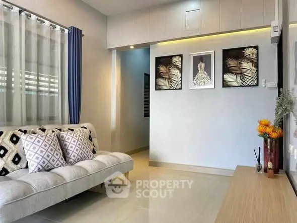 Modern living room with stylish decor and cozy seating area