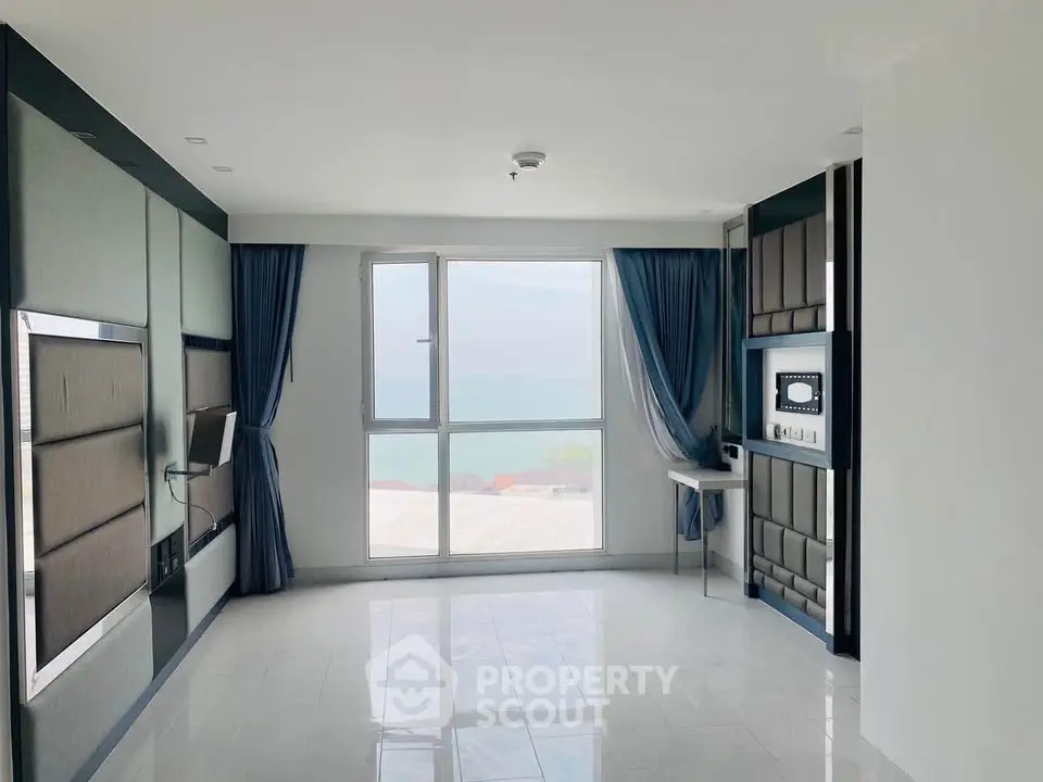 Spacious modern living room with ocean view and elegant decor