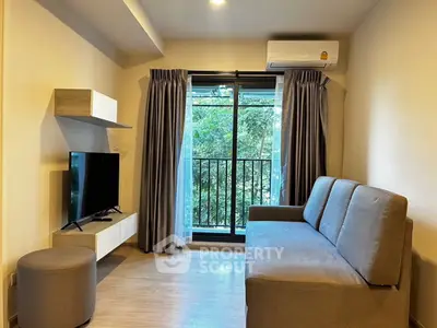 Modern living room with balcony view and sleek furniture