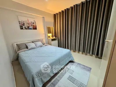 Cozy bedroom with modern decor and large window curtains, perfect for relaxation.