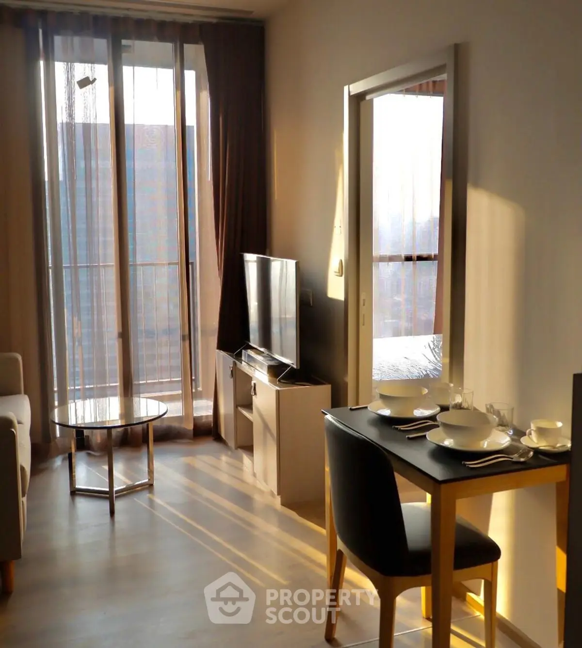 Cozy living room with dining area and natural light
