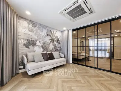 Elegant living room with stylish sofa and artistic wall design