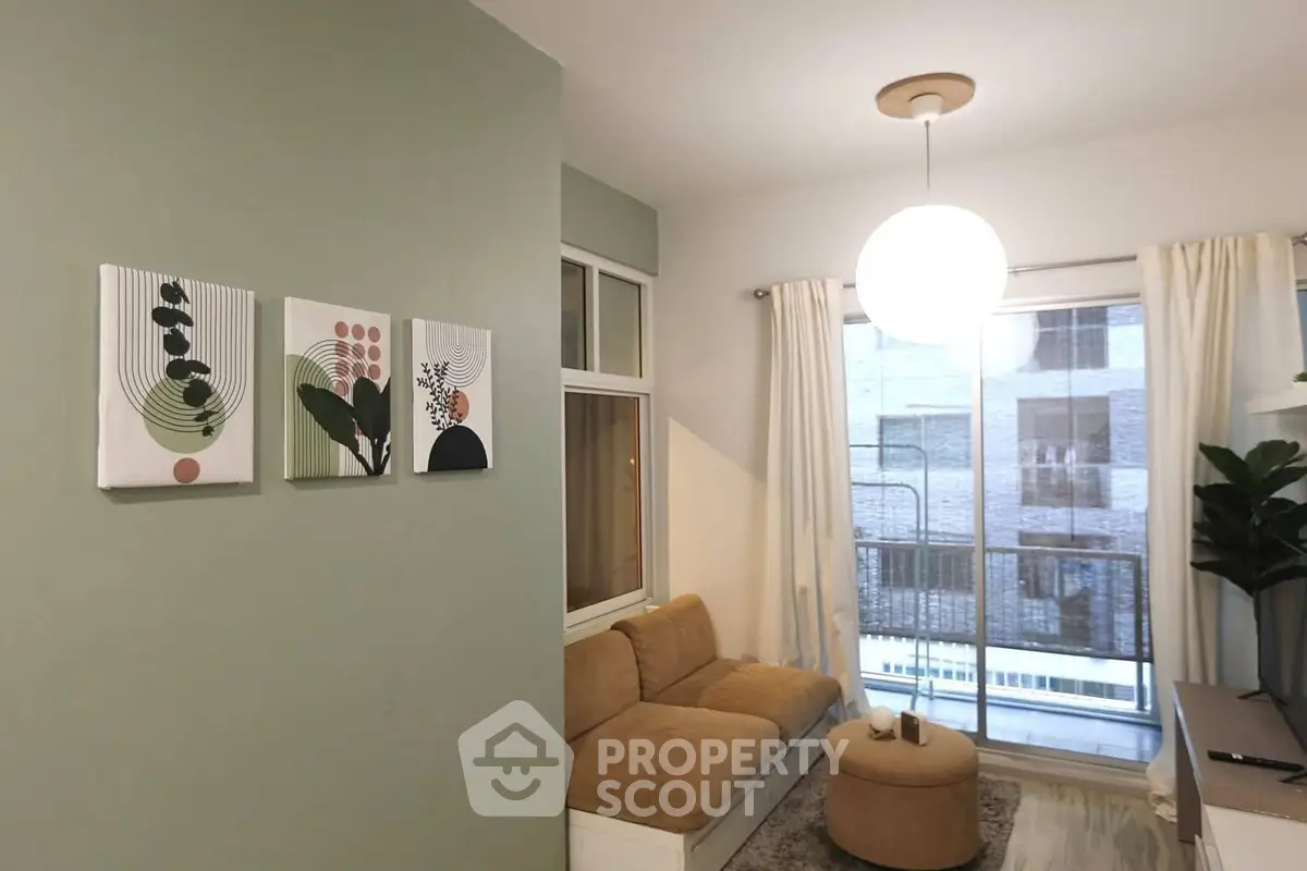 Cozy living room with modern decor and large window view