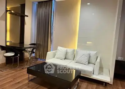 Modern living room with sleek furniture and ambient lighting