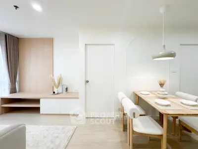 Modern dining area with elegant wooden furniture and soft lighting in a stylish apartment.