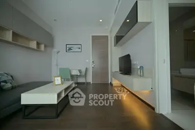 Modern living room with sleek furniture and ambient lighting