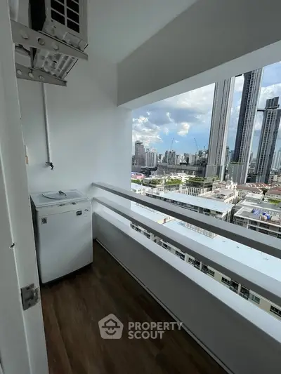 Modern balcony with washing machine and stunning city skyline view