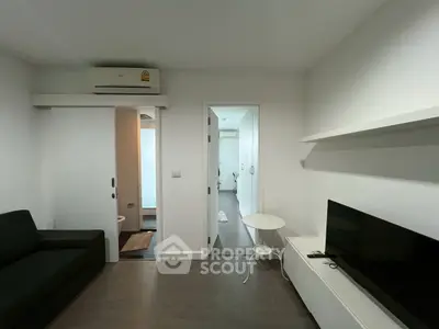 Modern living room with minimalist decor and sleek furniture