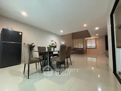 Spacious modern dining area with elegant decor and ample natural light