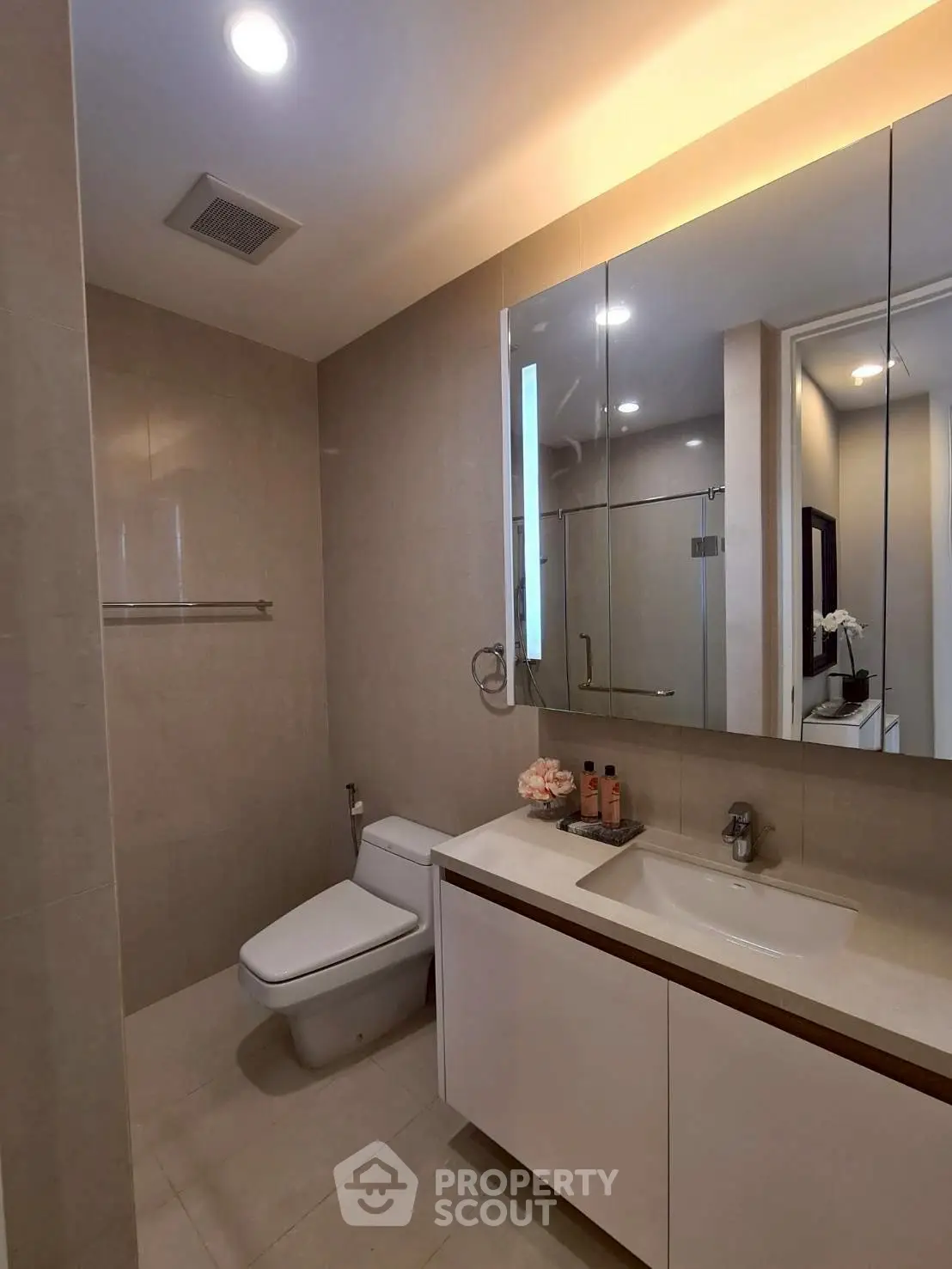 Modern bathroom with sleek fixtures and elegant lighting