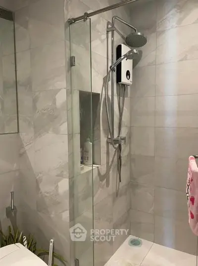 Modern bathroom with sleek shower design and elegant tile work
