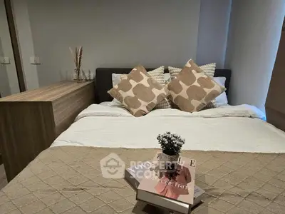 Cozy bedroom with stylish decor and neutral tones, perfect for relaxation and comfort.