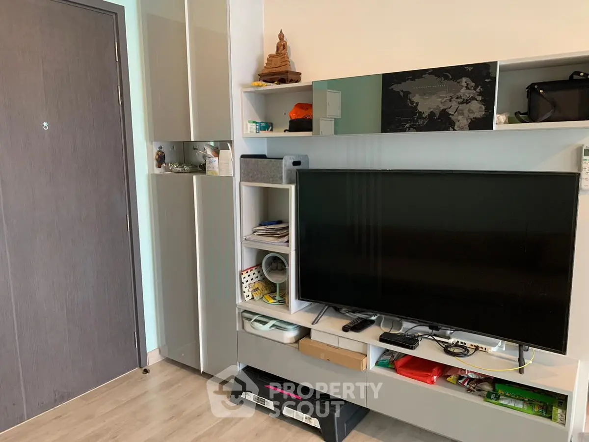 Modern living room with sleek TV unit and stylish decor