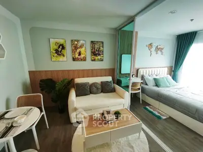 Modern studio apartment with cozy living area and stylish bedroom