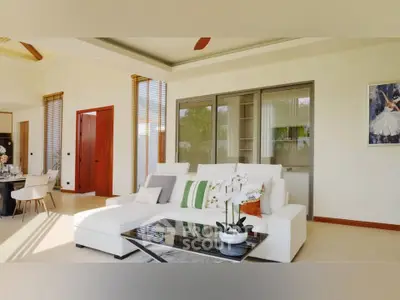 Luxurious living room with modern decor and elegant furniture in a bright, spacious home.