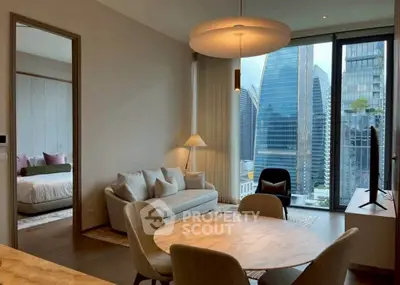 Modern living room with city view, elegant furniture, and natural light