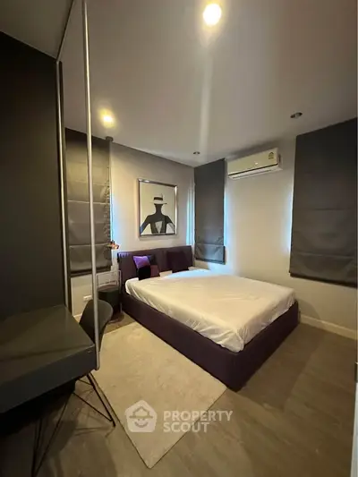 Modern bedroom with stylish decor and cozy ambiance