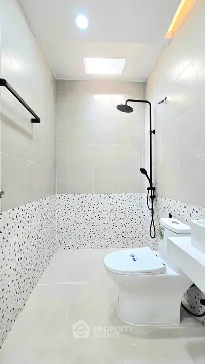 Modern bathroom with sleek shower and stylish tile design
