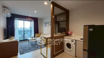 Modern living room with balcony view and integrated laundry area in stylish apartment.